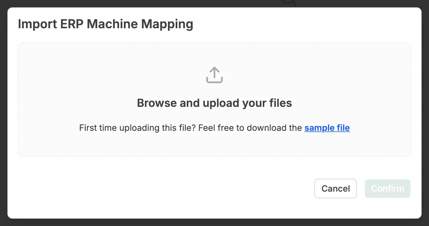 The Import ERP Machine Mapping dialog, with an upload area that reads Browse and upload your files and First time uploading this file? Feel free to download the sample file, with sample file as a link, and the Cancel and Confirm buttons; Confirm is greyed out.