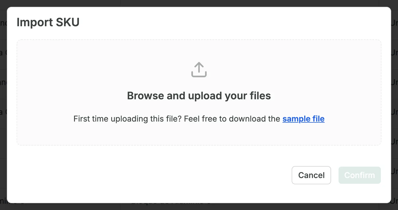 The Import SKU window, with the Browse and upload your files area, the line First time uploading this file? Feel free to download the sample file with sample file as a link, and the Cancel and Confirm buttons.