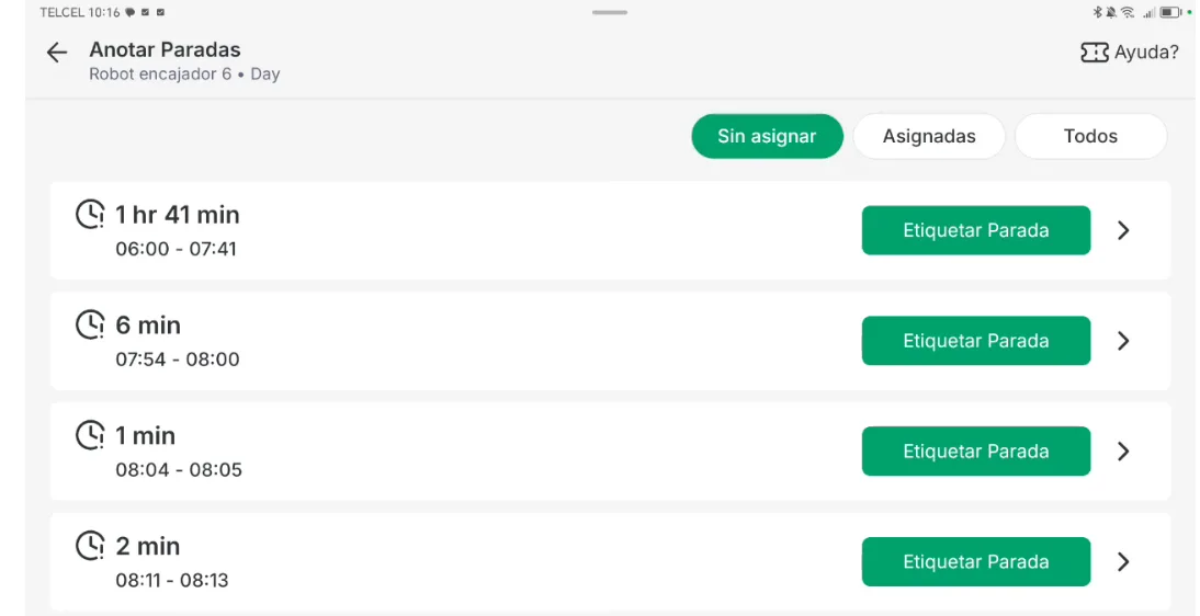 The Annotate Stops screen for a machine, on the Unassigned tab next to Assigned and All, listing stops with their duration and start and end times, and a Label Stop button and an arrow on each.