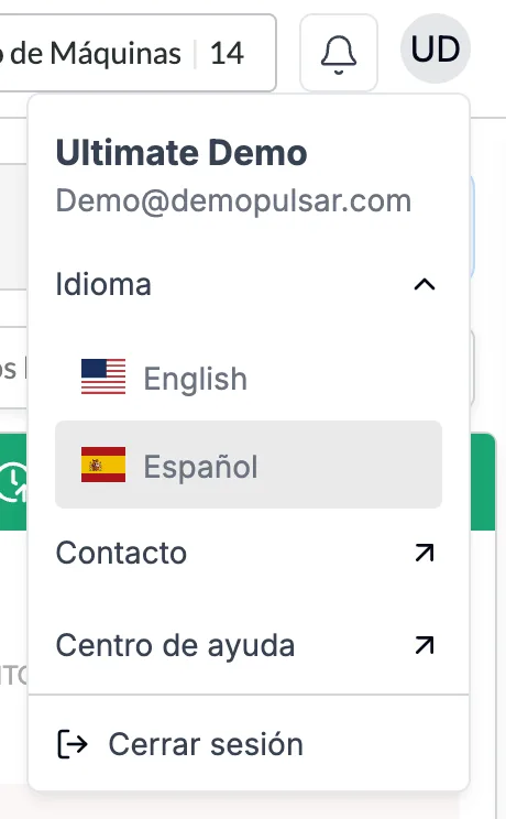 El menú de perfil abierto debajo del botón con las iniciales, arriba a la derecha de la aplicación de escritorio, con el nombre y el email del usuario, Idioma con English y Español (seleccionado), y luego Contacto, Centro de ayuda y Cerrar sesión.