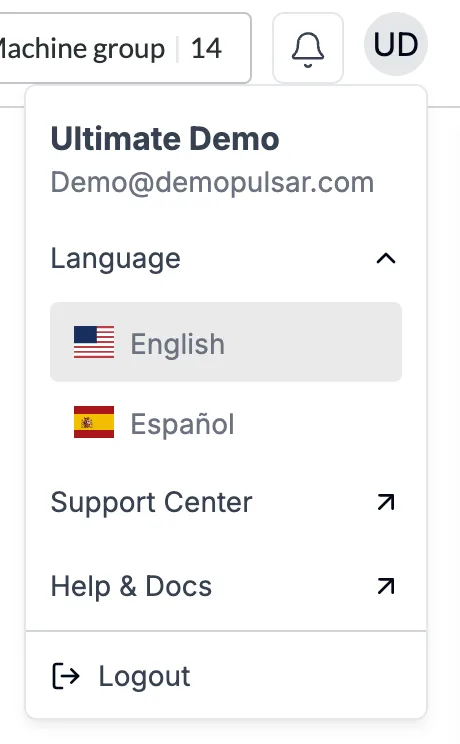 The profile menu open below the initials button at the top right of the desktop app, showing the user's name and email, Language with English (selected) and Español, then Support Center, Help & Docs and Logout.