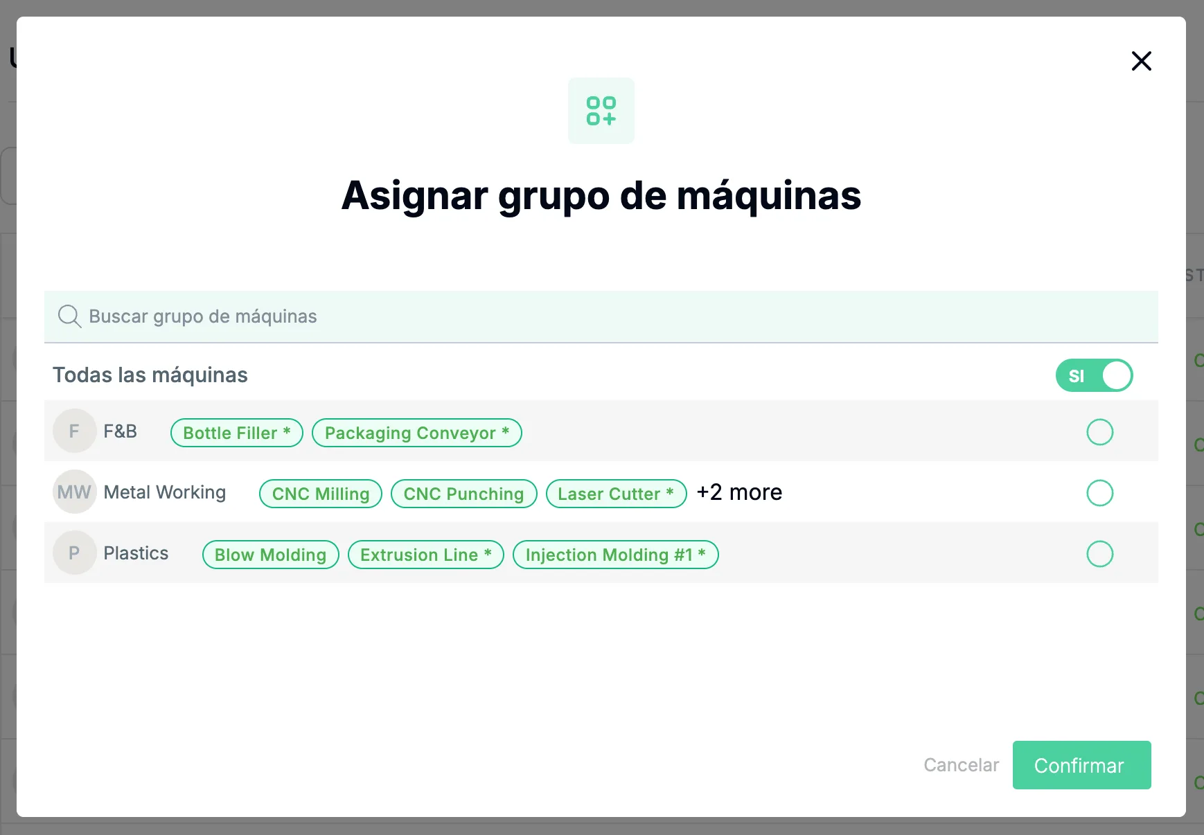 La ventana Asignar grupo de máquinas, con el buscador, la fila Todas las máquinas con su switch en SI, una lista de grupos de máquinas con las máquinas de cada uno y un círculo para seleccionar cada grupo, y los botones Cancelar y Confirmar.